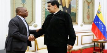 Shakes Hands with Maduro