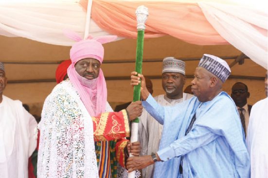 Governor Ganduje presents staff of office to the new Emir of Kano, Aminu Ado Bayero