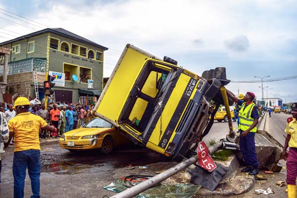 Six passengers were killed on Tuesday, March 31st, 2020 in Lagos, when a truck fell on a fully-loaded taxi.