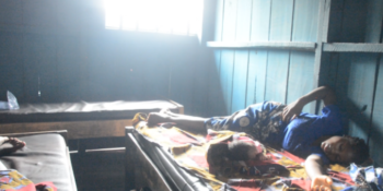 Mother and her newborn baby in a floating Makoko "hospital"