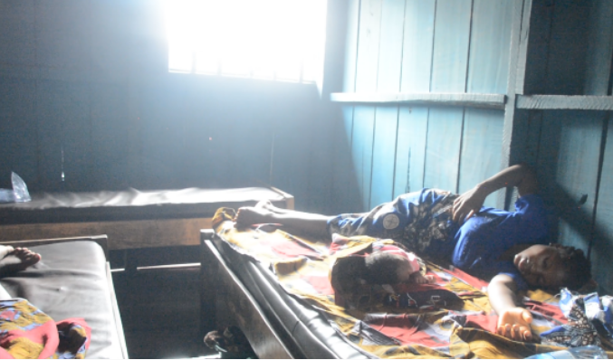 Mother and her newborn baby in a floating Makoko "hospital"