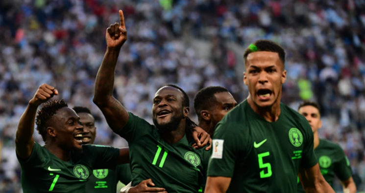 Nigeria's forward Victor Moses (2nd-L) celebrates after equalising from the penalty spot during the Russia 2018 World Cup Group D football match between Nigeria and Argentina at the Saint Petersburg Stadium.