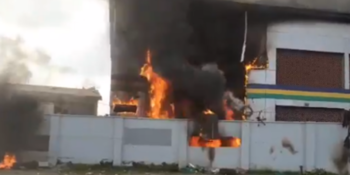 A police station set ablaze by hoodlums