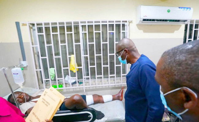 Governor Babajide Sanwo-Olu of Lagos State consoles a victim of the Lekki Tollate shooting at a hospital