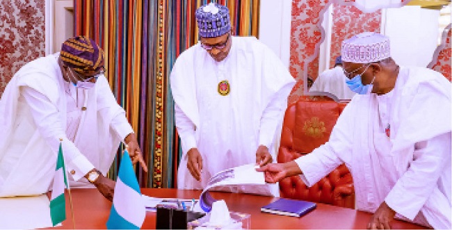 From left: Gov Babajide Sanwo-Olu of Lagos; President Muhammadu Buhari and Chief of Staff to the President, Prof Ibrahim Gambari going through the report on the #EndSARS protest presented by Gov Sanwo-Olu during his visit to the Presidential Villa in Abuja Friday, November 6th, 2020