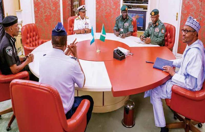 President Muhammadu Buhari holding a security meeting with top military and police officers