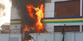 Burning police station