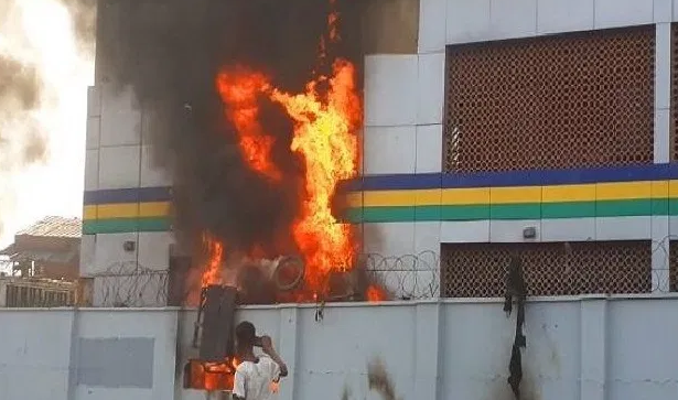 Burning police station