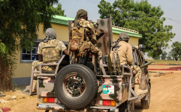 Armed bandits in army uniform